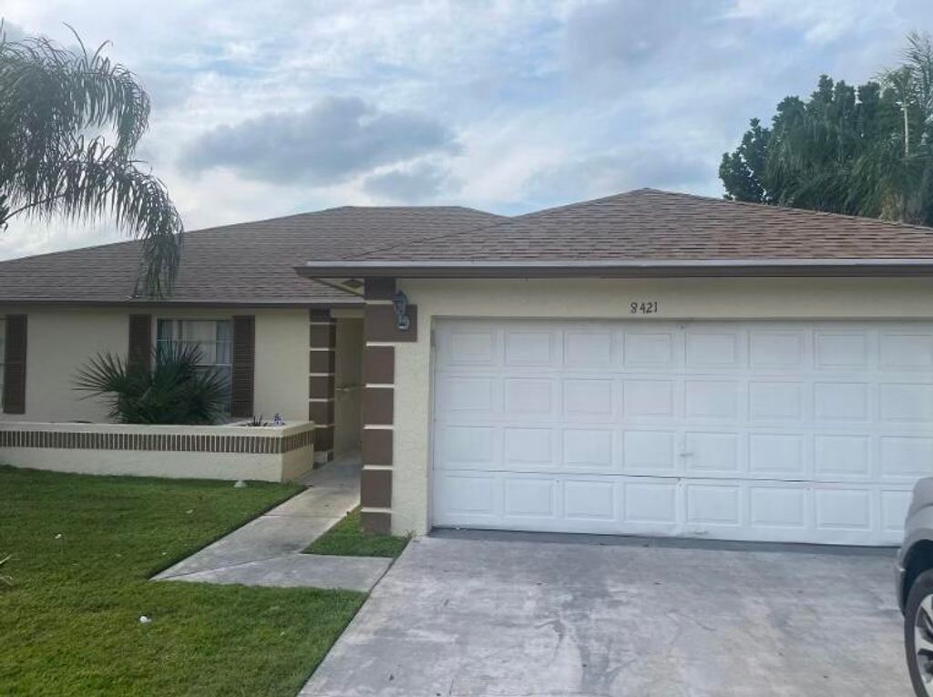 Photo of 8421 Winnipesaukee Way, Lake Worth, FL 33467 (MLS # B26031120)