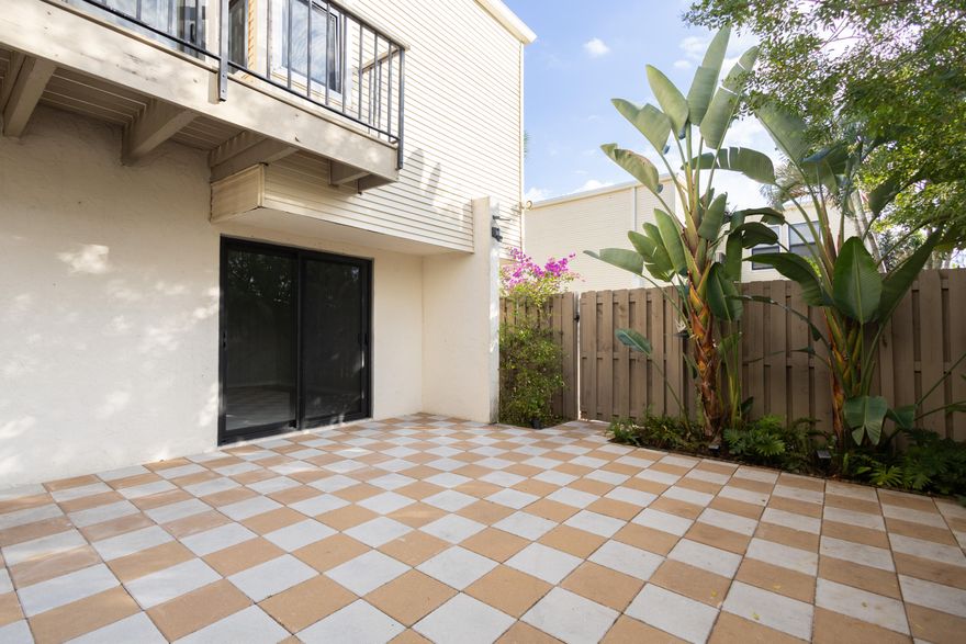 Charming 3-bedroom, 2.5-bathroom townhome in Wellington, FL, perfectly located near Wellington Mall, dining, entertainment, and A-rated schools. This home features a new roof, brand-new AC, and impact windows throughout for peace of mind. Enjoy lake views from all three bedrooms, including the primary suite with its private balcony, and a large fenced, beautifully landscaped courtyard ideal for relaxing or entertaining. Additional highlights include a spacious patio, washer and dryer in-unit, and extra storage under the stairway. A perfect combination of comfort and convenience in a prime Wellington location!