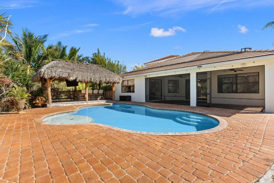 Tucked away in a quiet, sought-after neighborhood, this 5-bedroom, 3-bathroom home offers 3,041 sq. ft. of stylish living on one of the largest lots in the community, backing to a serene nature preserve.
Inside, a grand double-door entry leads to an open floor plan with a gourmet kitchen, oversized island, walk-in pantry, and custom shelving. The spacious living area features an elegant fireplace, while walk-in closets provide ample storage. A three-car garage adds convenience and extra space.
Step outside to your private backyard oasis—a saltwater pool, screened patio, and a tiki hut for outdoor fun make it perfect for entertaining. Fully fenced with plenty of space to roam, this home is minutes from top-rated schools, beaches, and dining.

Don't miss this rare opportunity!