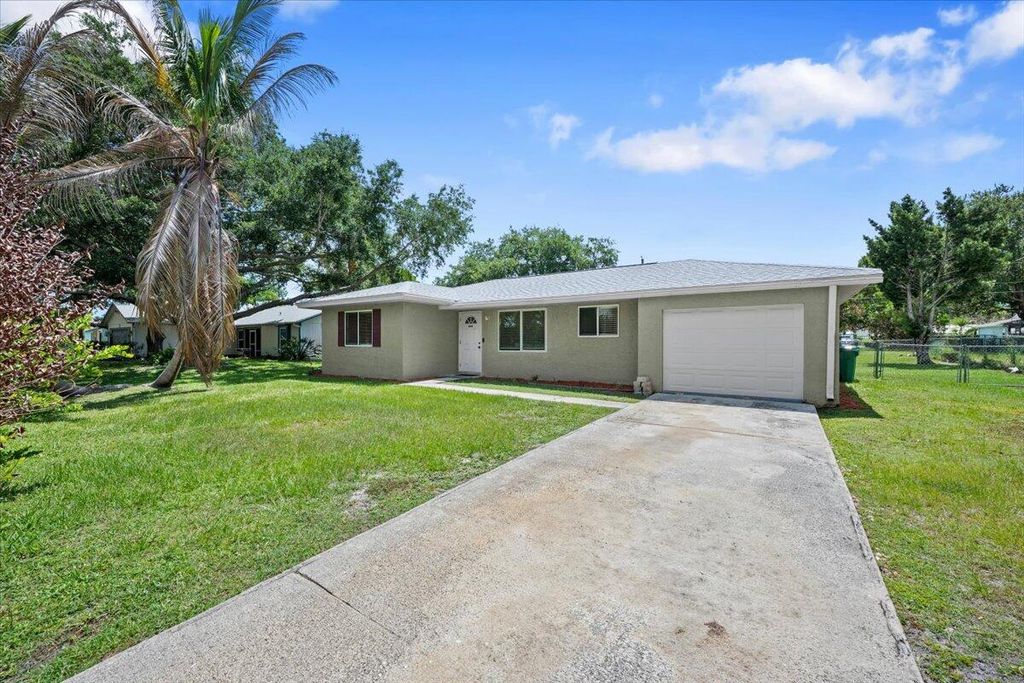 Photo of 2261 SE Pear Lane, Port Saint Lucie, FL 34952 (MLS # B26042153)