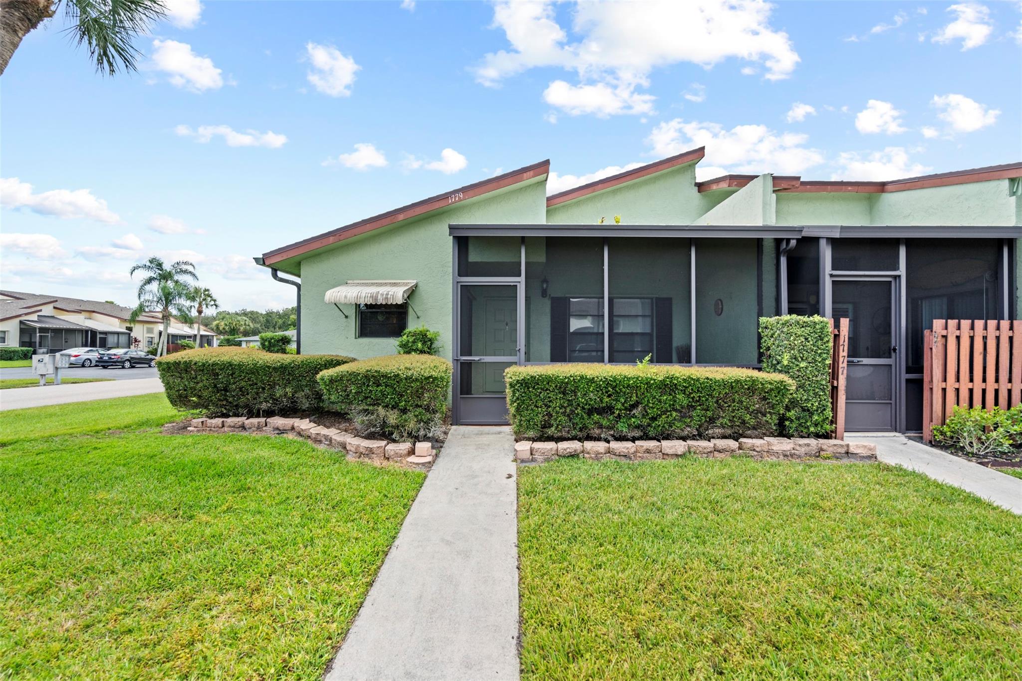 What a great value for this spacious 2br/2ba end-unit condo with a large screened porch in the Savannah's! Brand new carpet installed, spacious primary bedroom with ensuite bath, dual vanities, separate tub and shower, and large walk-in closet. Enjoy affordable living with reasonable HOA fees that cover cable/high-speed internet, water, sewer, lawn care, amenities, and roof. You'll also love the community clubhouse with activities, pool, tennis, shuffleboard, and fitness area. Close to public beaches, shopping, Indian River Dr, and Jensen Beach.
