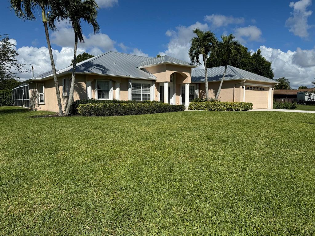 Photo of 2190 SE Flanders Road, Port Saint Lucie, FL 34952 (MLS # R10984278)