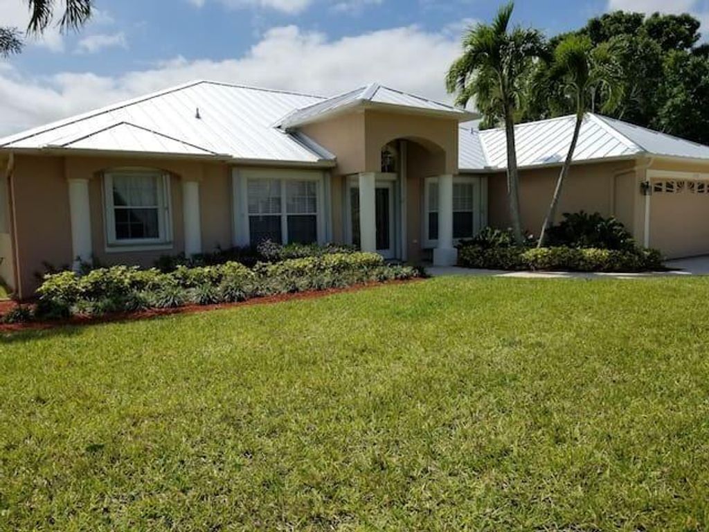 Photo of 2190 SE Flanders Road, Port Saint Lucie, FL 34952 (MLS # R10984278)