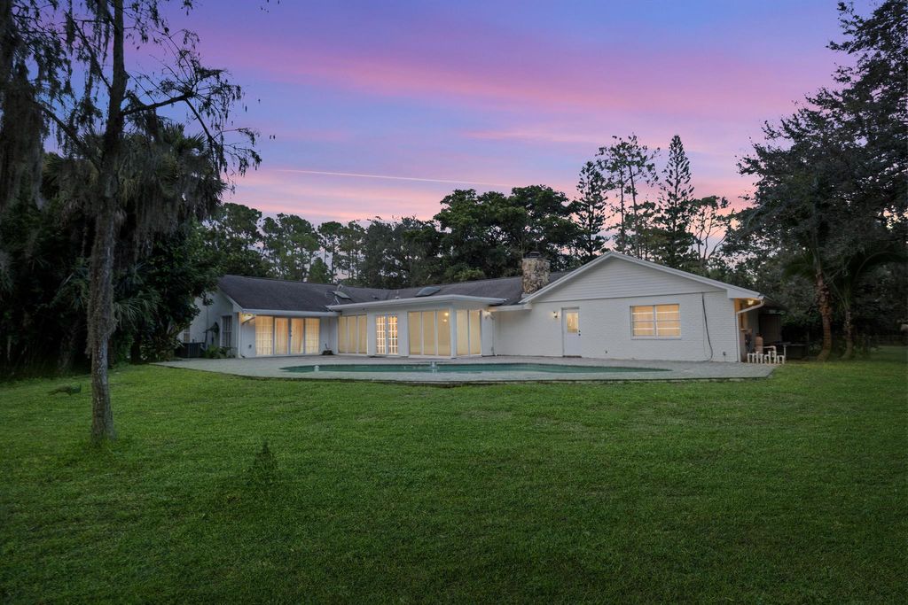 Photo of 2619 Palm Deer Drive, Loxahatchee, FL 33470 (MLS # R11130572)