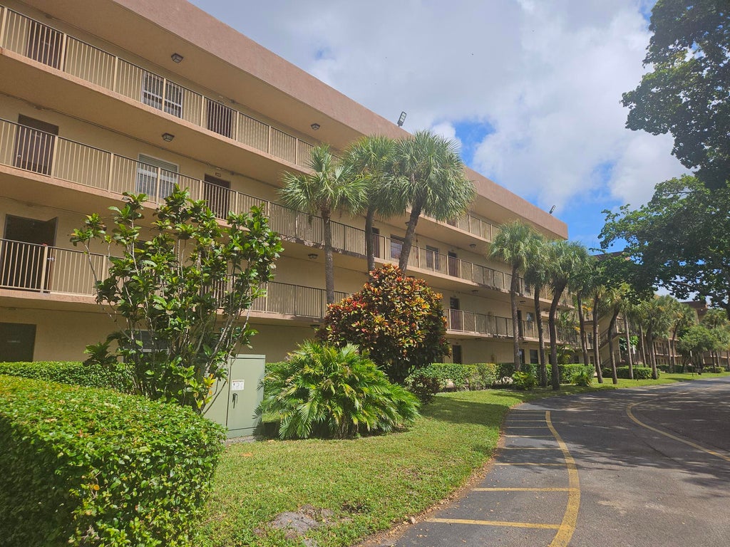 Photo of 3121 NW 47TH Terrace #210, Lauderdale Lakes, FL 33319 (MLS # B26093784)