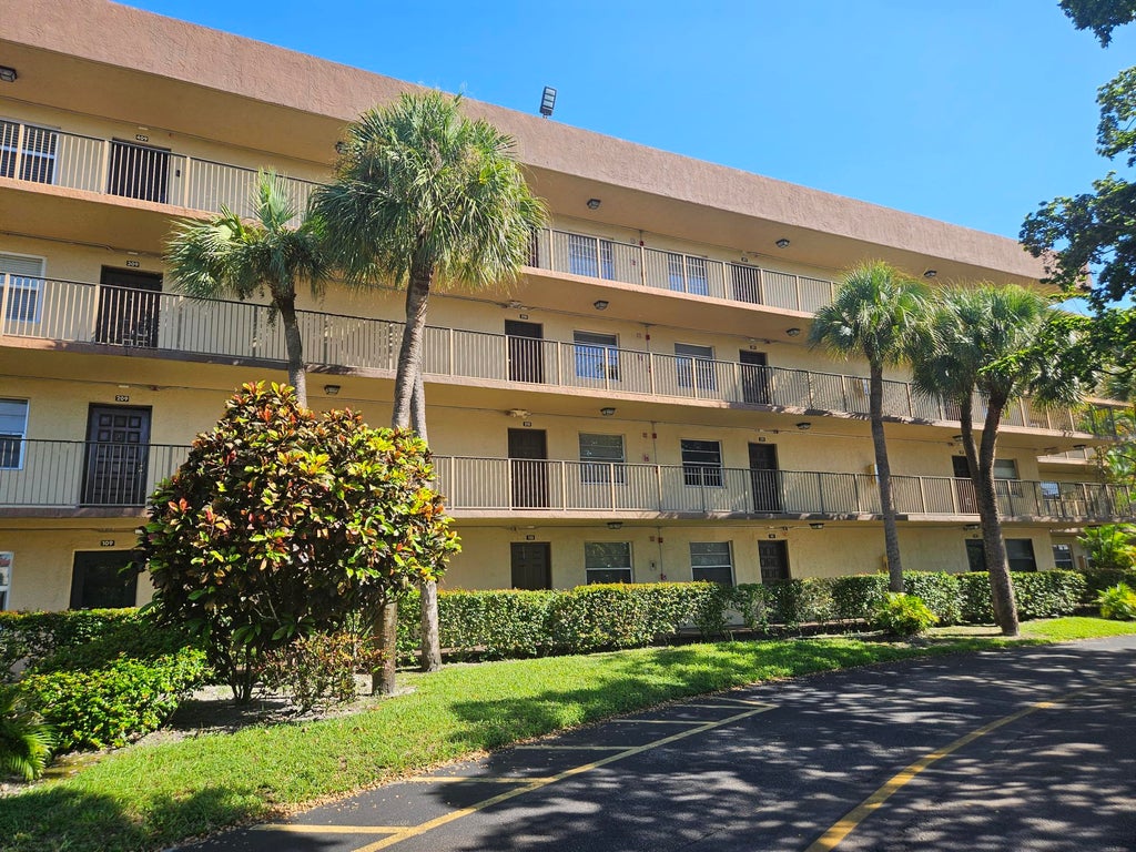 Photo of 3121 NW 47TH Terrace #210, Lauderdale Lakes, FL 33319 (MLS # B26093784)