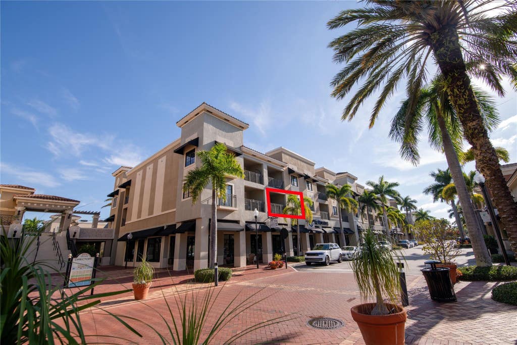 Photo of 4883 Pga Boulevard #202, Palm Beach Gardens, FL 33418 (MLS # F10495161)