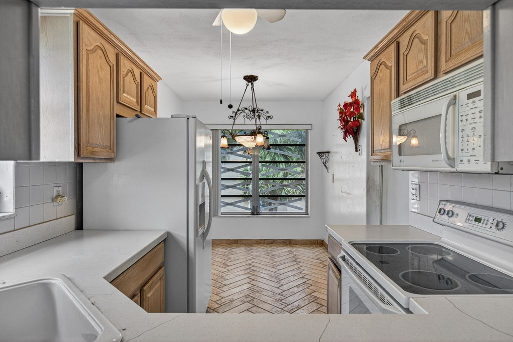 Photo of 6200 NW 62nd Street #312, Tamarac, FL 33319 (MLS # B26016687)