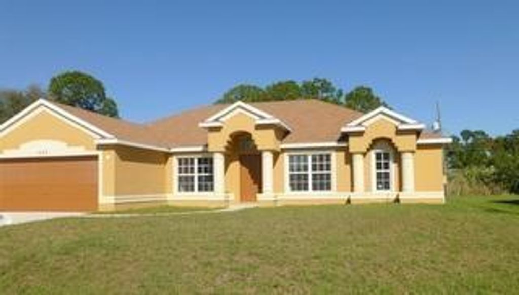 Photo of 425 SE Starfish Avenue, Port Saint Lucie, FL 34983 (MLS # R11002687)