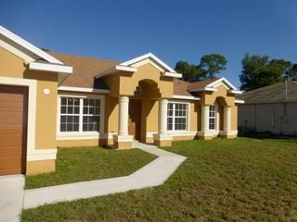 Photo of 425 SE Starfish Avenue, Port Saint Lucie, FL 34983 (MLS # R11002687)