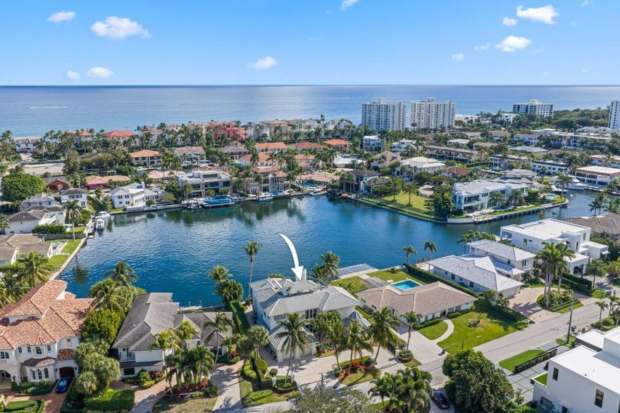 Incredible Waterfront home situated on the most coveted section of exclusive Bel Lido Isle, positioned on the widest expanse of the basin with premiere Southeast exposure delivering panoramic water views, steady Atlantic Breezes & Direct Intracoastal access w/ the protection of the deep-water harbor. Features include a Grand Foyer with a sweeping wrought-iron staircase & soaring ceilings The living room is light filled w/ a fireplace and built in bar The formal Dining room has an elegant butler's pantry w/custom glass-front cabinetry. The Gourmet chef's kitchen features custom wood cabinetry, oversized center island w/ premium appliances including a gas range w/ warming lights and a warming drawer. Off the kitchen is the family room & adjoining breakfast area w/ expansive water views On the Upper level there is an entertaining area with a fireplace and private balcony, serving as a central gathering space for the upstairs bedrooms which are situated off the area. There are 2 laundry rooms, one downstairs and one up in the master suite. The master suite is completed with a beautiful bath with a spa tub and dual headed shower and an office/ exercise room adjoining. There is also an area for an elevator if so desired. 
There is also an outdoor staircase to a 3rd floor patio where a bar can be added and an elevator can access. The views from here are phenomenal. The home also has a Generator. For the boater the dockage is incredible on this protected basin with direct Intracoastal access with no fixed bridges. All of this and on Bel Lido you get keyed beach access just a short stroll away. True Florida Living!!