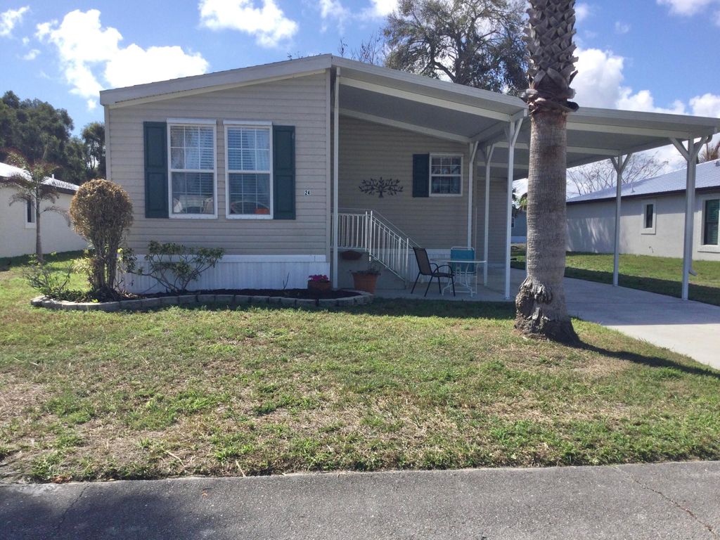 Photo of 24 Golf Dr, Port Saint Lucie, FL 34952 (MLS # B26000892)