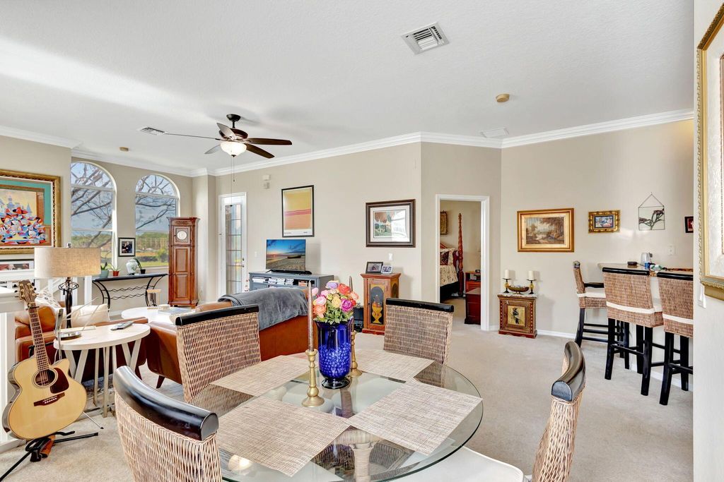 Photo of 4941 Bonsai Circle #211, Palm Beach Gardens, FL 33418 (MLS # R11086913)