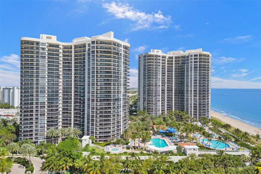 Incredible opportunities await with this expansive unique 7,000 sq foot split floorplan condo with unparalleled views. Direct ocean, Intracoastal, and city views from each of the 6 balconies and the floor to ceiling windows throughout. IMPACT windows and doors. Two separate living areas and kitchens. 5 bedrooms plus office, and 5 full bathrooms, including 2 full bathrooms in the main primary bedroom, make this condo an amazing find. 3 garage parking spaces near the elevator and extra storage unit. Private elevator entrance, controlled temp wine room, 3 separate A/C zones, wet bar with fridge and ice maker, surround sound and 12 foot ceilings! L'Hermitage has incredible amenities with 2 pools, tennis courts, gym, party room, and restaurant w/ 24 hour gated security for the complex.