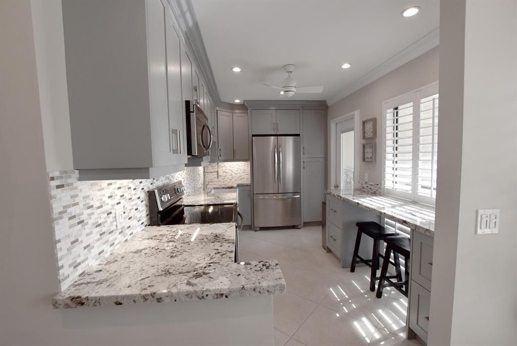 Photo of 4315 Quail Ridge Drive N #Sandpiper, Boynton Beach, FL 33436 (MLS # R10675368)