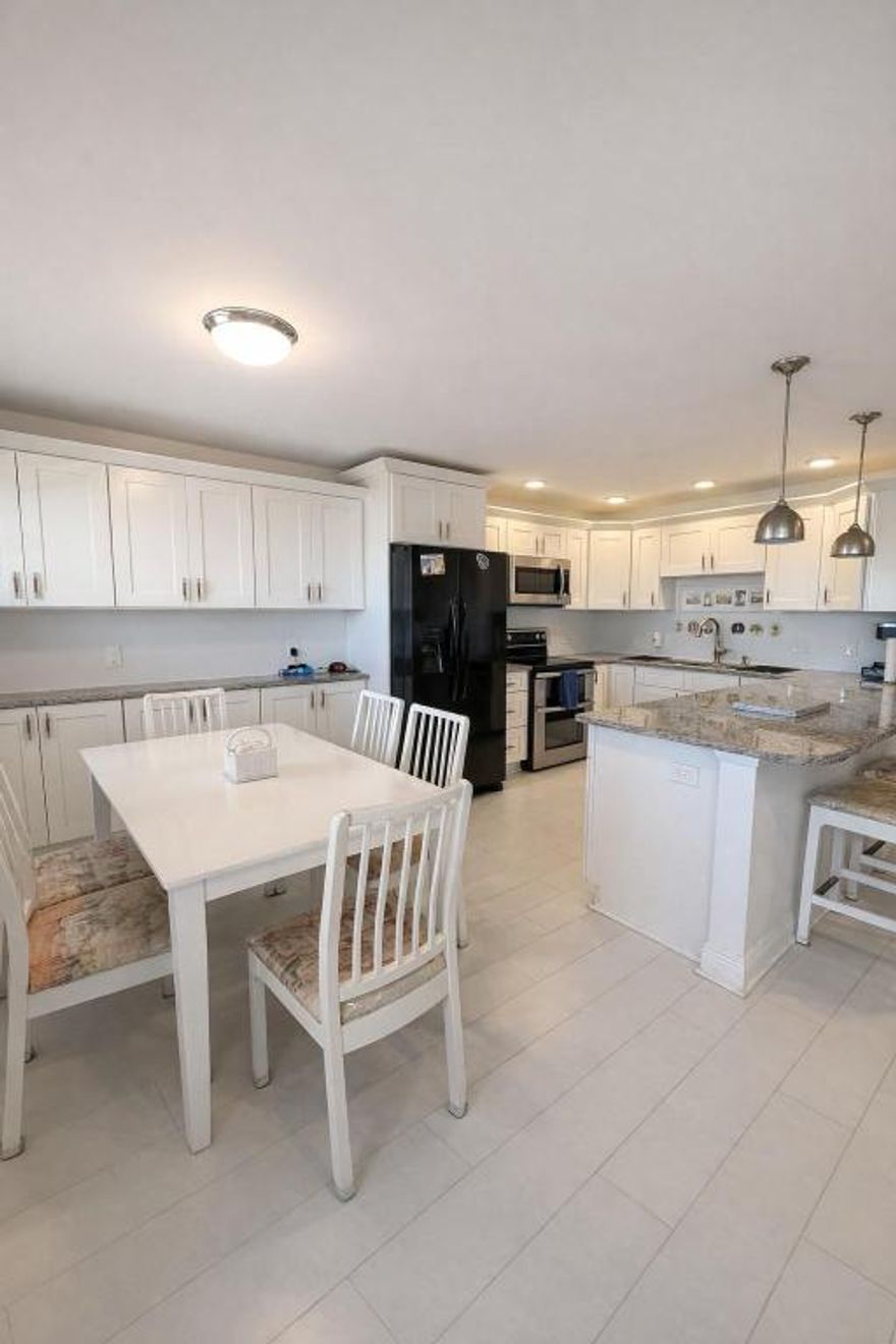 This beautifully updated 2-bedroom, 2-bathroom condo is located in a desirable active 55+ community and offers magnificent lake views. Featuring a bright and breezy 4th-floor location, the open-concept kitchen and living area create an inviting space for both relaxing and entertaining. The kitchen includes dual sinks, adding both style and convenience. Enjoy a well-maintained and highly regarded association, with the clubhouse and house of worship just a short walking distance away. A wonderful opportunity to enjoy resort-style living in a prime setting.