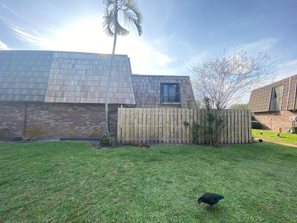 Photo of 1705 Forest Lakes Circle #C, West Palm Beach, FL 33406 (MLS # R10962917)