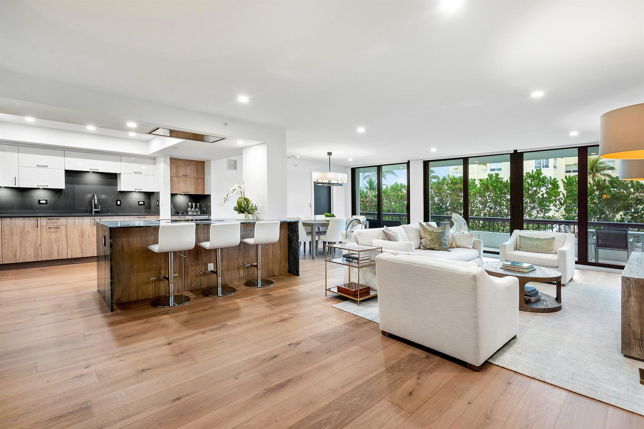 Immerse yourself in ocean views from this stunning, fully renovated 2 bed, 2.1 bath retreat at Beach Point. Gut renovated from top to bottom: Experience the feeling of ''brand new'' in this property, completely redesigned with your comfort and modern living in mind. The optimized floor plan boasts a new powder room for added convenience, an integrated office area maximizing space, and smart features throughout. Step inside and be wowed: Gorgeous Laguna Beach European white oak flooring flows seamlessly underfoot, leading you to a chef's dream kitchen. Imagine culinary creations on the Silver Wave Leathered Finished Marble waterfall island, featuring top-of-the-line appliances like a Fulgor Milano induction stovetop and oven, Liebherr refrigerator/freezer, and sleek, high-end