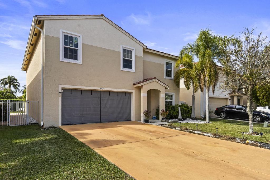 Photo of 6627 Rainwood Cove Lane, Lake Worth, FL 33463 (MLS # R11052889)