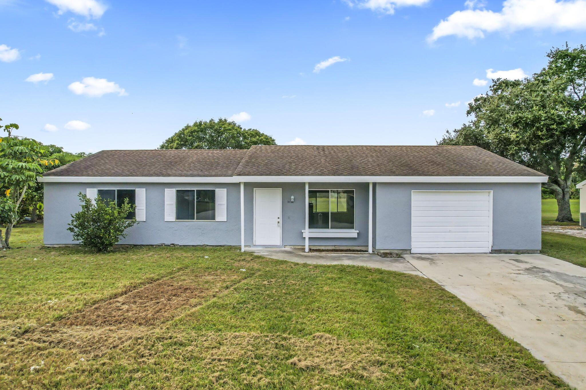 Discover the epitome of comfortable living in this recently renovated 3-bedroom, 2-bathroom home located in the desirable city of Port St. Lucie, Florida. This move-in ready residence offers a perfect blend of modern luxury and convenience, providing an ideal space for you and your family.Key Features:Spacious Living Areas: Enjoy the open and inviting living areas, perfect for relaxation and creating lasting memories with family and friends.Private Master Suite: The master bedroom is a true retreat, offering a spacious layout, ample closet space, and a beautifully renovated ensuite bathroom.Two Additional Bedrooms: The two additional bedrooms are well-appointed, providing versatility for guest rooms, home offices, or a growing family.Updated Bathrooms: