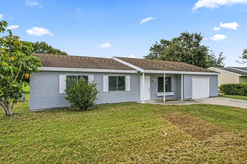 Photo of 3132 SW Watson Court, Port Saint Lucie, FL 34953 (MLS # R10941467)