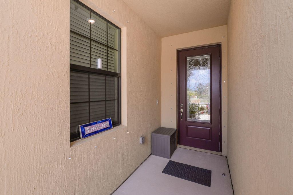 Photo of 1618 Merriment Way, Fort Pierce, FL 34947 (MLS # B26001641)