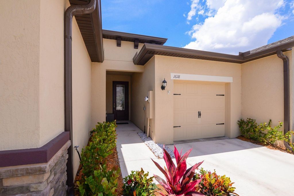 Photo of 1618 Merriment Way, Fort Pierce, FL 34947 (MLS # B26001641)