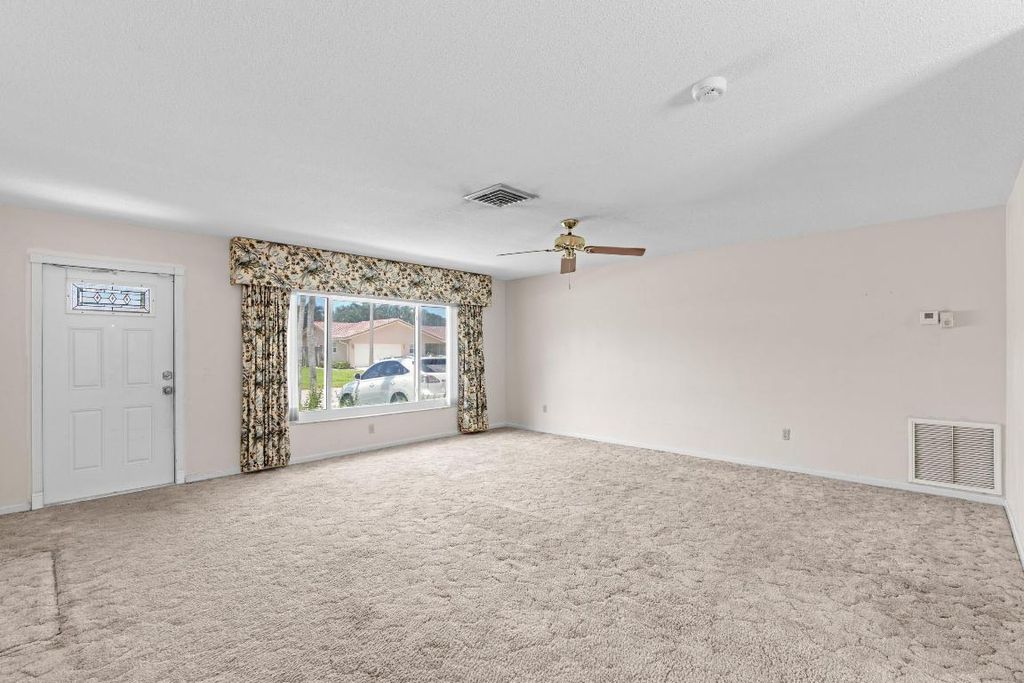 Photo of 3288 NW 25th Way, Boca Raton, FL 33434 (MLS # R11115040)