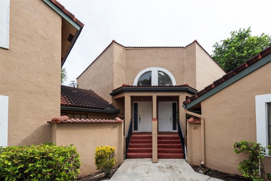 Spacious 3 bedroom/3 bath in the gated community of Lakeview Courts. Located  in a quiet cul-de-sac w/2 assigned parking spaces. One bedroom/one bath on the first floor and two bedrooms & two baths including the primary on the second floor. Open floor plan w/views of the canal. Open deck off of the primary bedroom provides even better views.  Updated kitchen 2017, quartz counters, stainless & tiled floors. Appliances replaced 2017.  Large great room for entertaining w/access to the kitchen & Florida room. Florida room could be an office, den or additional bedroom.  Has closet & door to the exterior. Pet friendly. Low maintenance of $220 monthly includes gate, pool, playground & basketball. Close to schools, shopping & restaurants. See community improvements in progress under Broker remarks