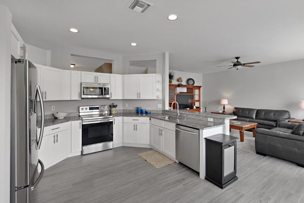 Photo of 3861 Newport Avenue, Boynton Beach, FL 33435 (MLS # R11127007)