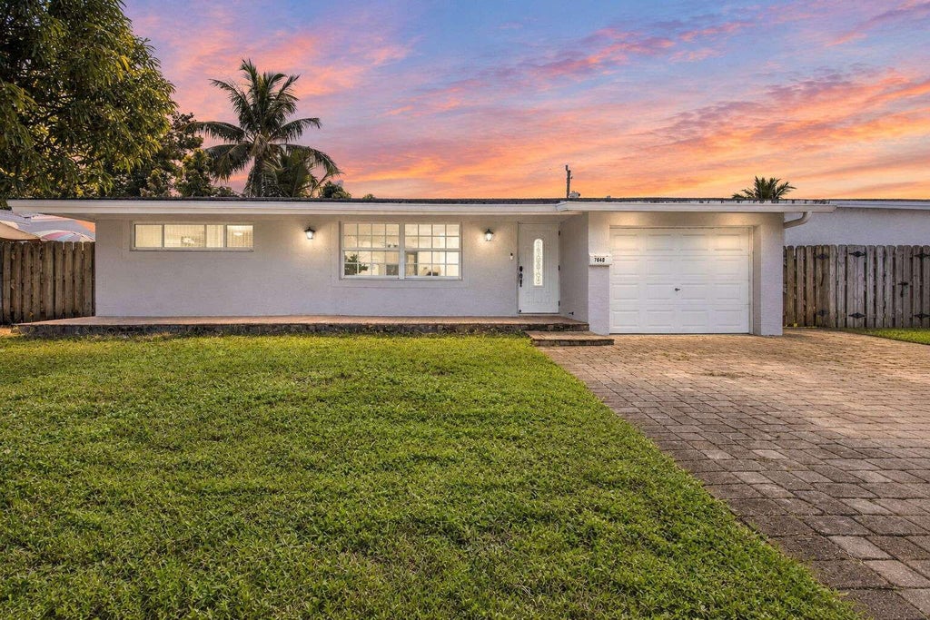 Photo of 7640 SUNSET STRIP, Sunrise, FL 33322 (MLS # B26078603)
