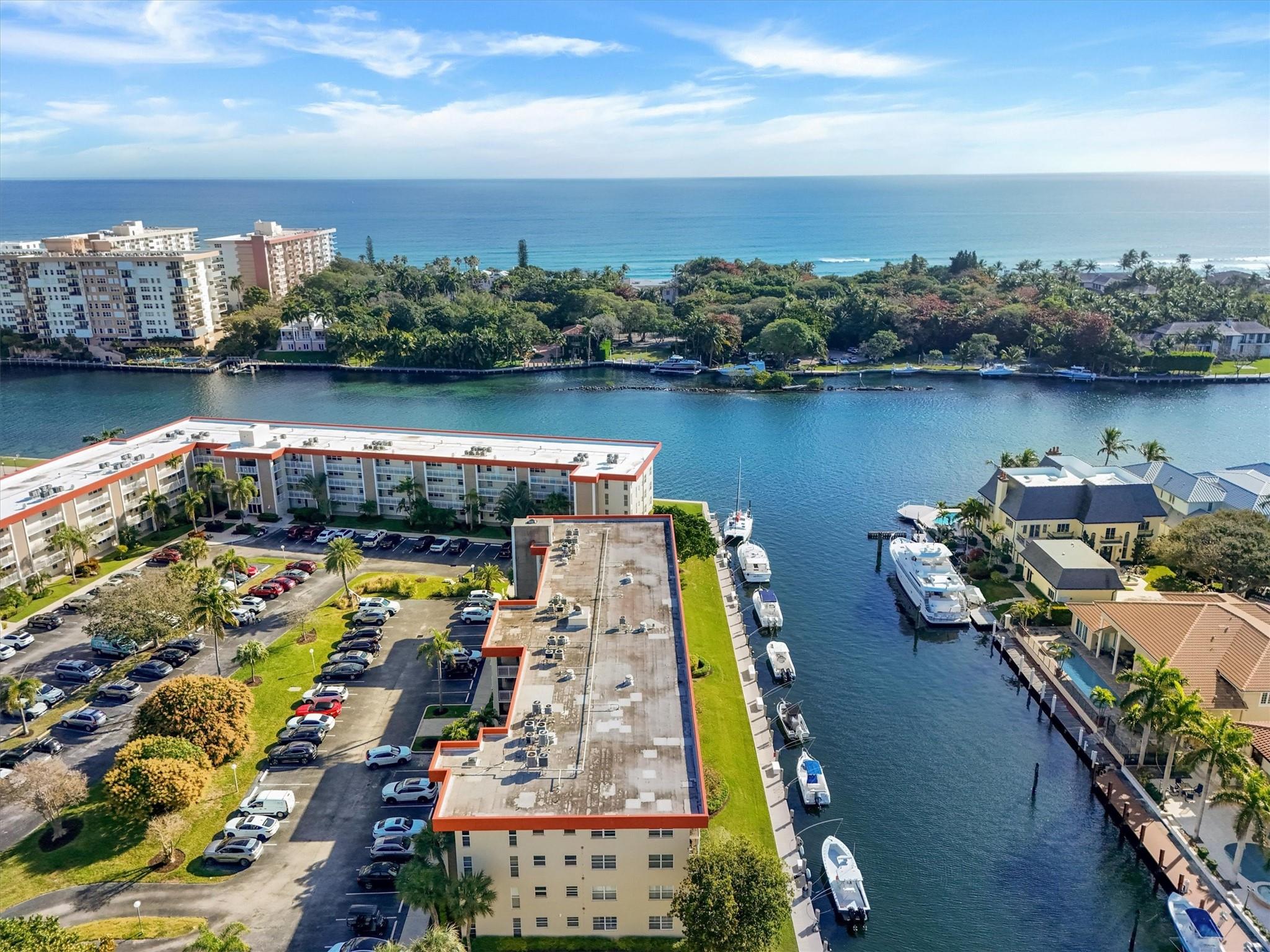 Welcome to this highly sought after penthouse corner unit that promises an unparalleled living experience. This exceptional residence boasts expansive canal and intercostal views across from the multi million dollar homes. The spacious rooms are designed with ample storage, natural light and marble flooring. Additionally, all windows and the enclosed patio feature impact glass with outstanding open view. Washer Dryer combo in the unit. Extra storage on the same floor. Boaters Heaven with deep water dock space on availability. Just steps away is a fabulous pool and clubhouse both with the stunning intracoastal views. Chosen best condo in Lighthouse point. FIFTY YEAR INSPECTION COMPLETED. No assessment and full reserve