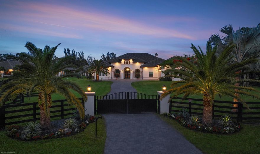 This stunning 5-acre farm in Fox Trail was built in 2022 with no expense spared. The property was expertly designed and sited on an east-west axis, an optimal layout to take advantage of tropical breezes.The main house features a three-way split floor plan with 4 bedrooms, an office and 4 bathrooms. There are Italian six foot plank porcelain floors throughout, two fireplaces, a chef's kitchen equipped with Wolf and Sub-Zero appliances, Italian Verona marble countertops and backsplash, luxurious polished nickel faucets, pot filler and accents, butler's pantry, a light-filled laundry room with Chicago brick floors and a custom made barn door that will make doing laundry effortless.The spacious master suite has large stacking sliding doors that lead to the pool