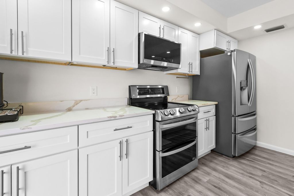 Photo of 102 1st Lane, Greenacres, FL 33463 (MLS # B26053365)