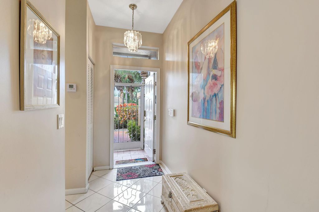 Photo of 9620 Crescent View Drive N, Boynton Beach, FL 33437 (MLS # R11090419)