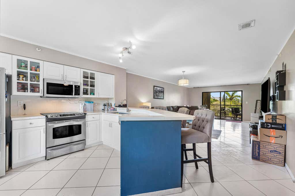 Photo of 2205 S CYPRESS BEND Drive #302, Pompano Beach, FL 33069 (MLS # B26067980)
