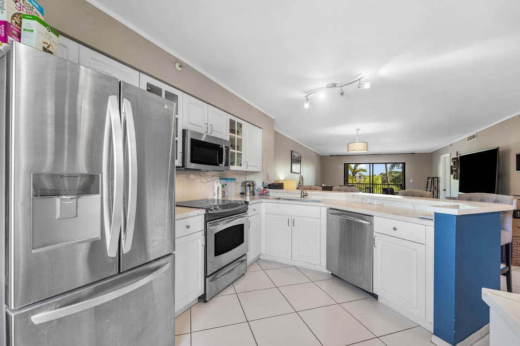 Photo of 2205 S CYPRESS BEND Drive #302, Pompano Beach, FL 33069 (MLS # B26067980)