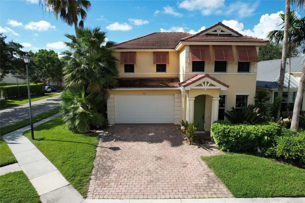 Photo of 236 Belle Grove Lane, Royal Palm Beach, FL 33411 (MLS # F10468816)