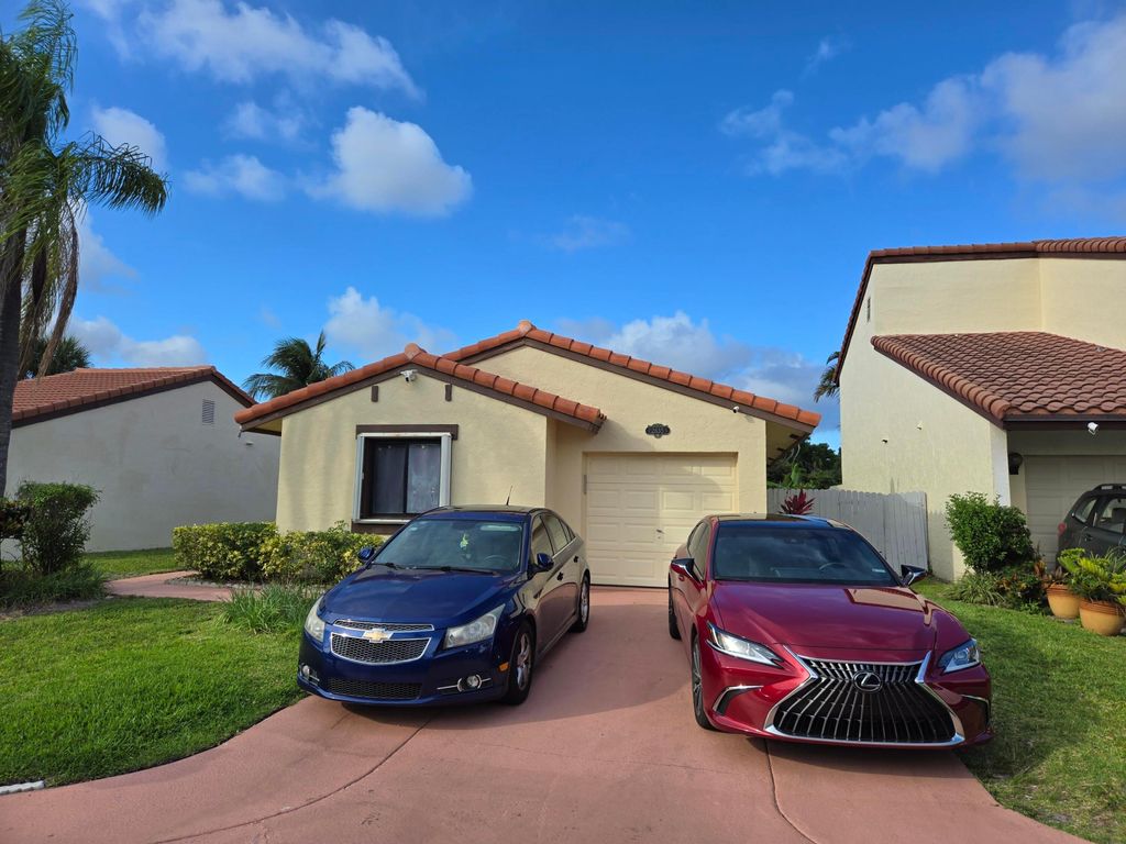 Photo of 2835 Sand Pines CT, Lake Worth, FL 33462 (MLS # B26032157)