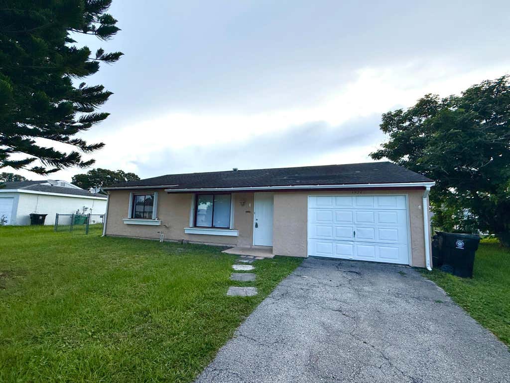 Photo of 1957 SE AVANTI Circle, Port Saint Lucie, FL 34952 (MLS # B26061983)