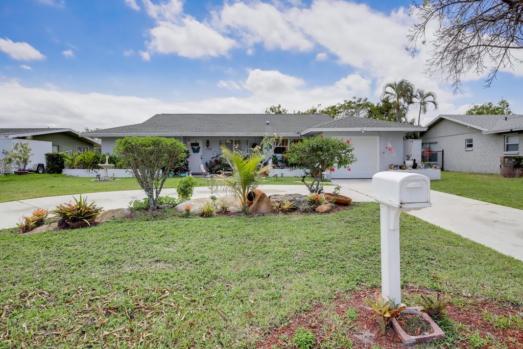 Photo of 110 Sandpiper Avenue, Royal Palm Beach, FL 33411 (MLS # R10789324)