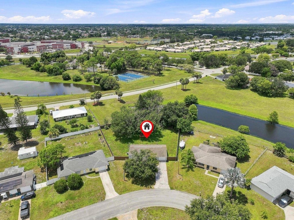 Photo of 484 SW EASTPORT Circle, Port Saint Lucie, FL 34953 (MLS # B26061886)