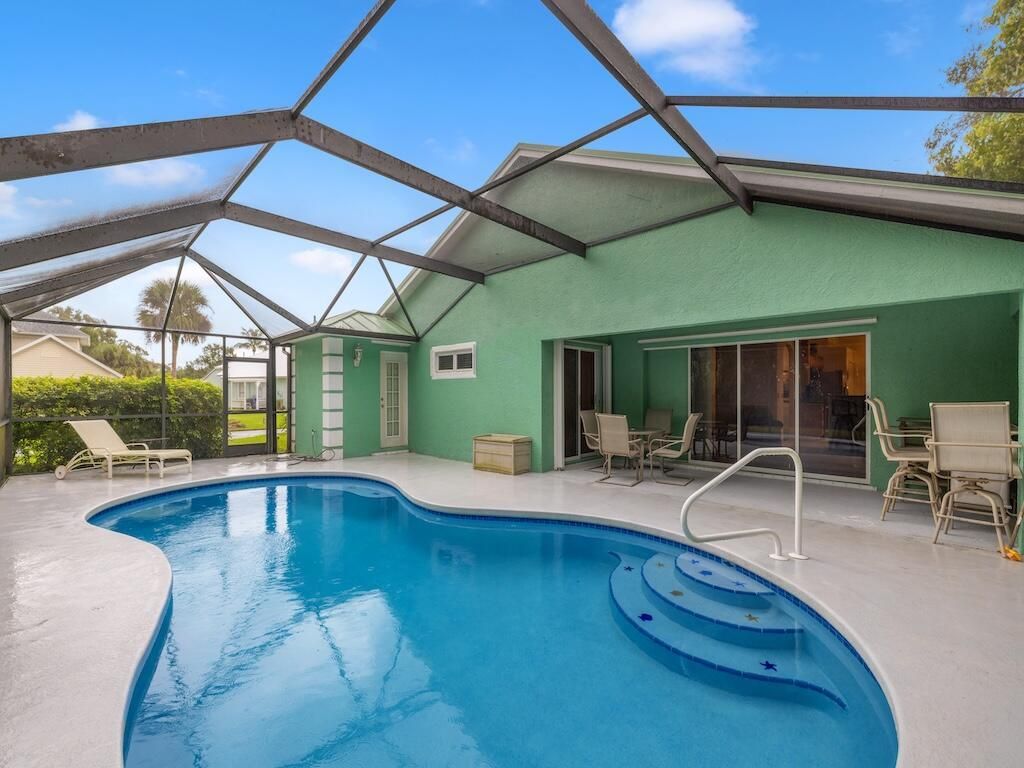 Photo of 5850 39th Lane, Vero Beach, FL 32966 (MLS # R11131858)