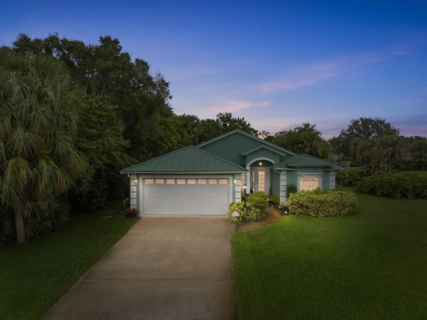 Located in a charming and highly desirable subdivision with LOW HOA and no lot rent, this beautifully maintained home offers the ultimate in low-maintenance Florida living. Enjoy peace of mind with a new metal roof, freshly painted exterior to match, new tile floors, and two solar tubes that fill the home with natural light. Additional upgrades include a new hot water heater and professionally landscaped grounds kept in pristine condition, giving the property amazing curb appeal. The layout offers comfort, functionality, and easy flow for everyday living or entertaining. Surrounded by friendly neighbors and just minutes from beaches, shopping, dining, and top-rated schools, this home blends quality, convenience, and value, making it an incredible find in Vero Beach.
