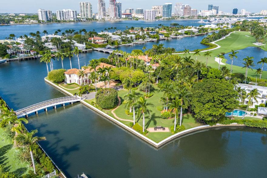 Tarpon Point, a rare waterfront corner/point lot in a secluded Estate Section premium location on an exceptional .53 acre site with 255+ directly on the water. Big & open views well positioned to design a new home to accommodate generations to come. Conveniently close to Worth Avenue.