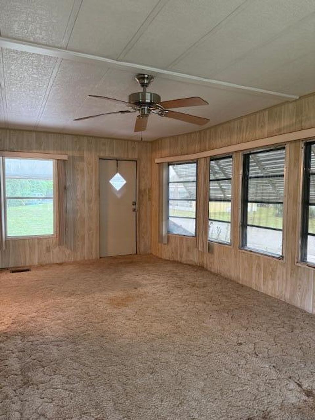 Photo of 9161 SW Ackel Drive, Stuart, FL 34997 (MLS # R11005006)