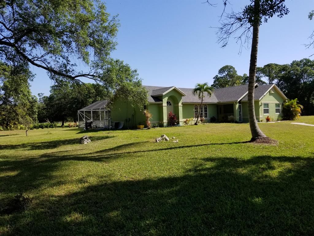 Photo of 14281 Orange Boulevard, The Acreage, FL 33470 (MLS # R10802857)