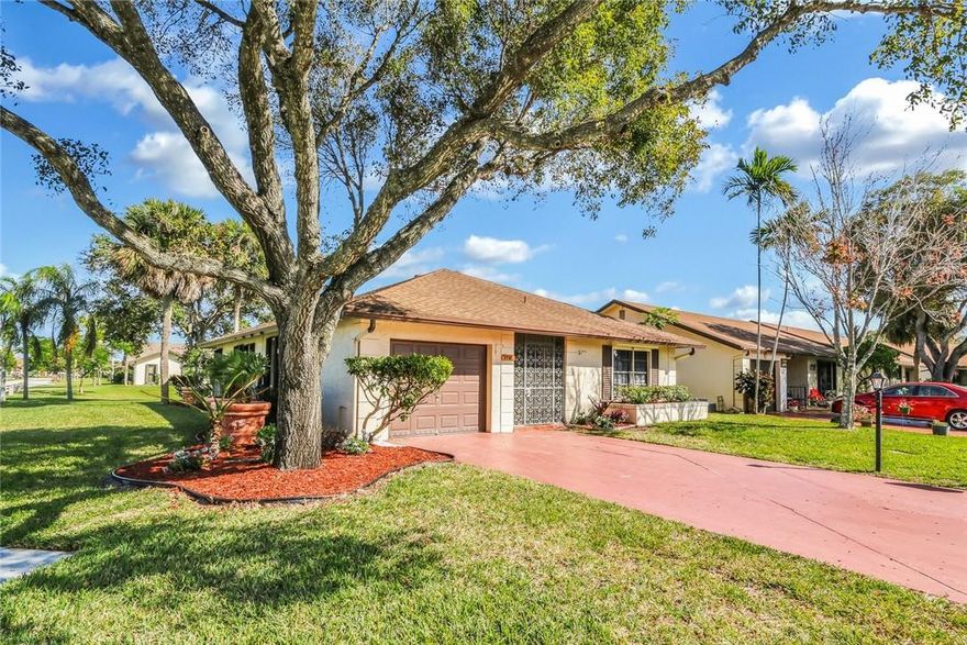 Best buy in the Meadows! Beautifully remodeled waterfront home in the community of The Meadows of Crystal Lake. Move right into this immaculate home with an open floor plan and split bedrooms. The updated kitchen features granite counters and newer stainless steel appliances. The master bedroom offers a high end built in closet. Master bathroom completely redone, Vermont marble counter top. The interior is freshly painted, no popcorn ceiling in living areas. Newer washer/dryer. Double impact patio door and storm shutters. Enjoy serene waterfront views from your patio and living room. This corner lot property is ideally located just across from the Clubhouse, heated pool and amenities. Close the amazing beaches in Deerfield beach, excellent Restaurants and shopping.