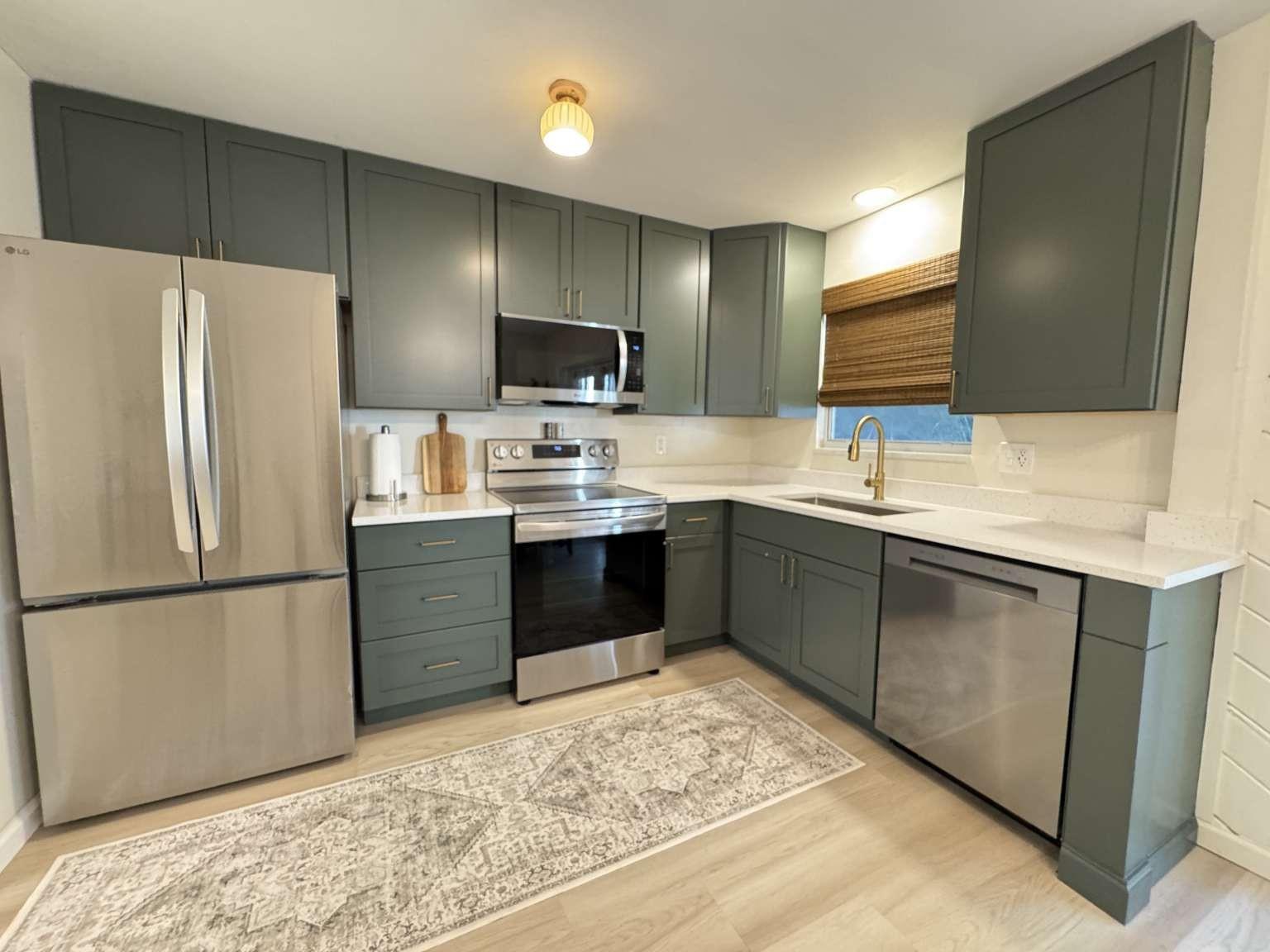 Completely renovated inside and out in 2025!
**New Metal Roof in 2025 **New AC Unit in 2025 **New Exterior Paint in 2025 **Complete Interior Remodel in 2025 **All Appliances New and Under Warranty **New Water Softener System in 2025 **New 40' Culvert to Additional Driveway to get Your RV, Boat, toys in with Ease
~Discover your slice of peace and privacy in highly sought-after Jupiter Farms. This charming 3-bedroom, 2-bathroom single-family home sits on a spacious 1.15-acre lot, offering endless potential for outdoor living, gardening, or future expansion.
~Inside, you'll find a cozy floor plan with a welcoming living area, brand new kitchen, and Lifeproof Vinyl Plank flooring in the main gathering space.