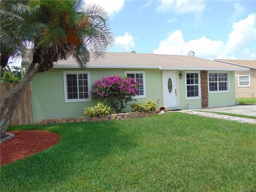 Great home for the right family located in North Lauderdale! 3 bedrooms and 2 baths. Updated kitchen with granite counter tops,stainless steel appliances and lots of extra cabinet space. Updated bathrooms. Tile floors throughout;bedrooms has wood floors. Covered Gazebo area in the backyard, perfect for bar-b-ques, entertaining and relaxation with the family.  Won't last!